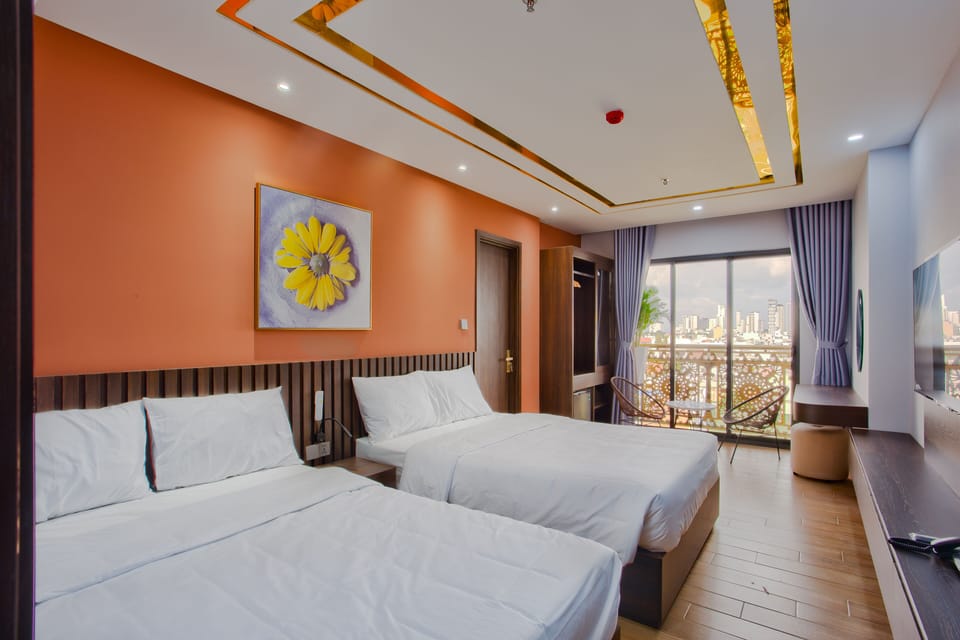Family Quadruple Room | Free minibar items, in-room safe, individually furnished, desk
