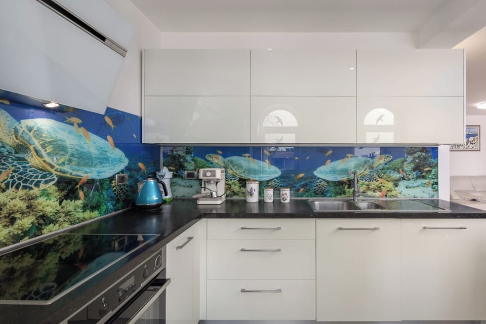 Family Apartment, 2 Bedrooms, Microwave (Apartment Ayni With Private Pool) | Private kitchen | Dining table