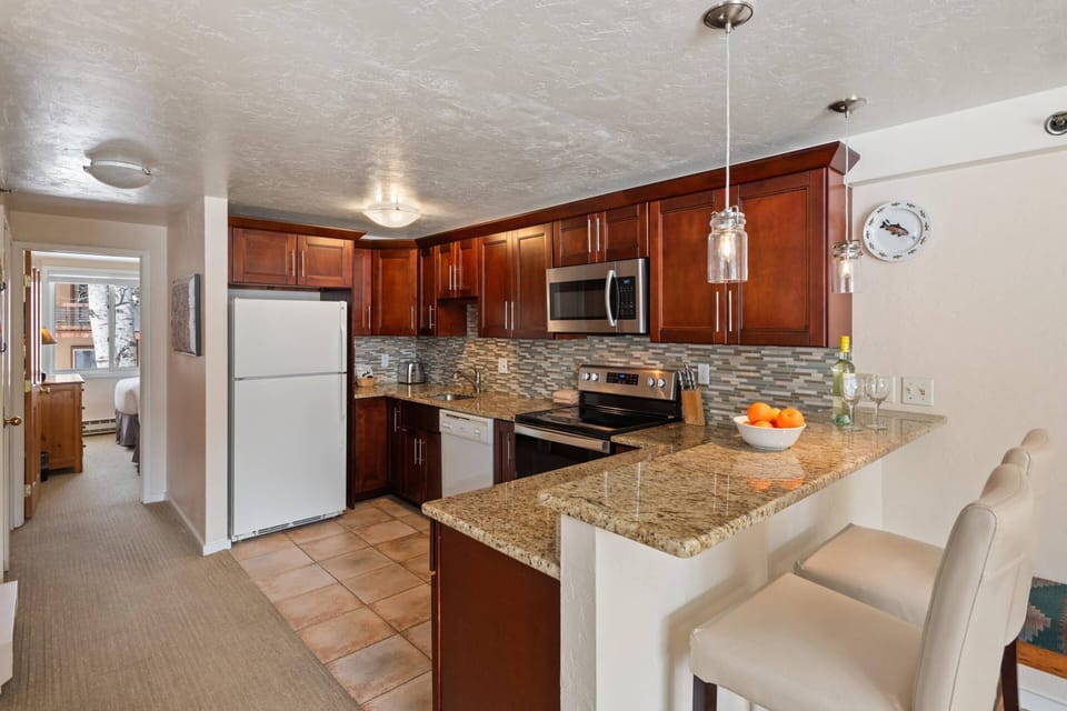 The spacious and fully stocked kitchen allows for dining in.  The convenient location means you can ski home for lunch!
