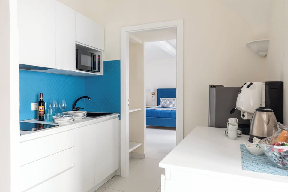 City Apartment | Private kitchen | Full-size fridge, microwave, stovetop, espresso maker