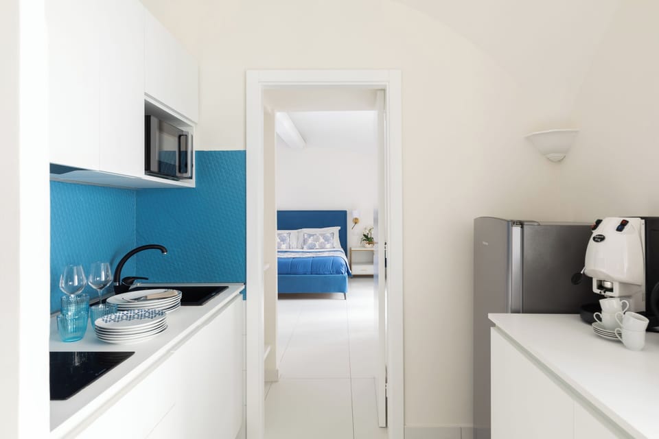City Apartment | Private kitchen | Full-size fridge, microwave, stovetop, espresso maker