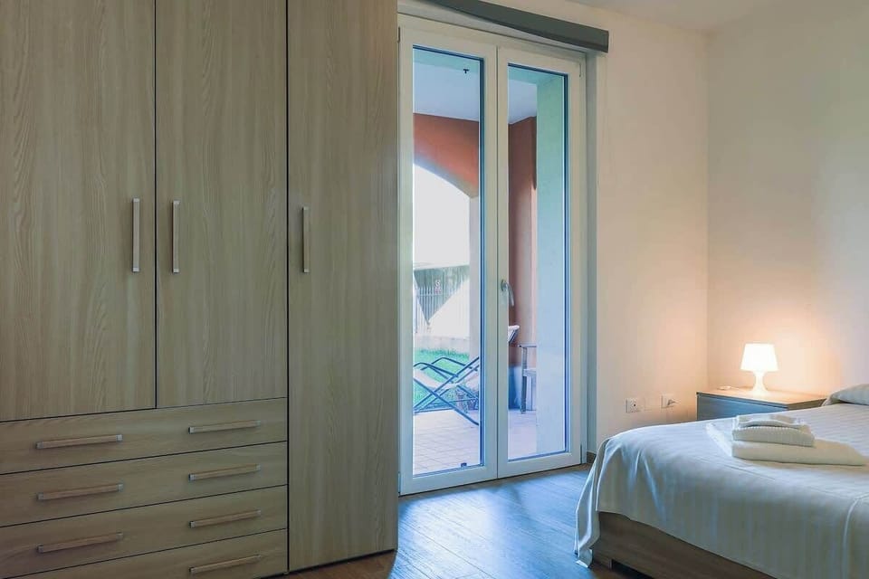 Double Bedroom with access and view of garden