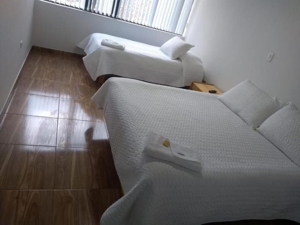 Executive Triple Room | Down comforters, desk, laptop workspace, free WiFi