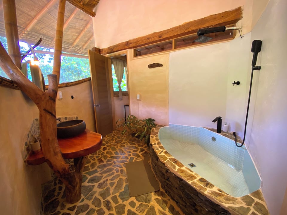 Deluxe Room, Garden View | Deep soaking bathtub