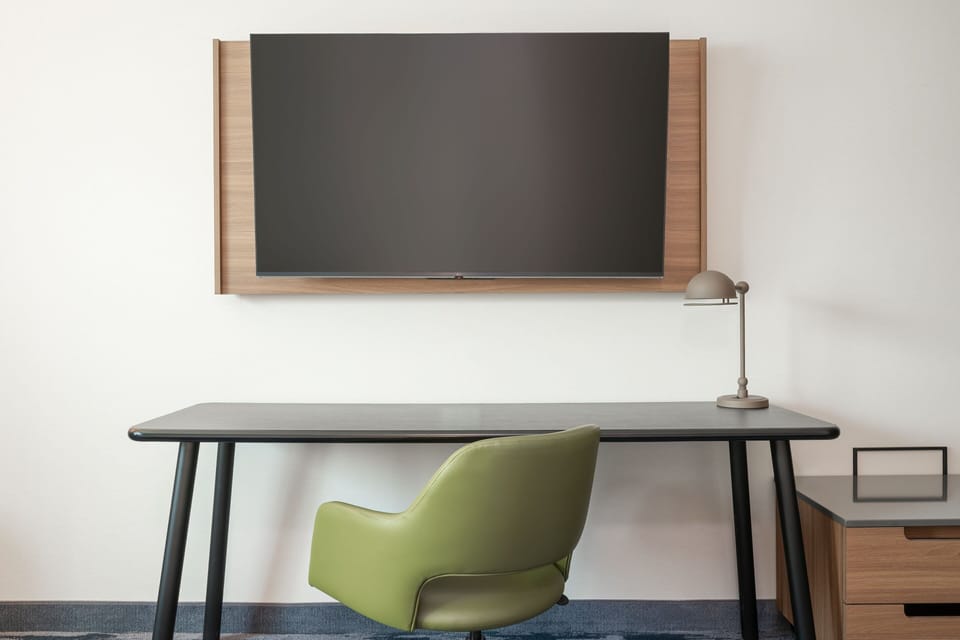 Premium bedding, pillowtop beds, desk, laptop workspace