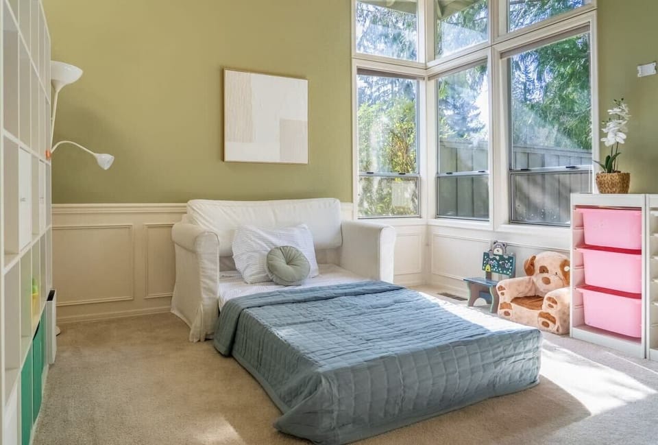 Futon in the playroom converted to a twin bed for extra guest