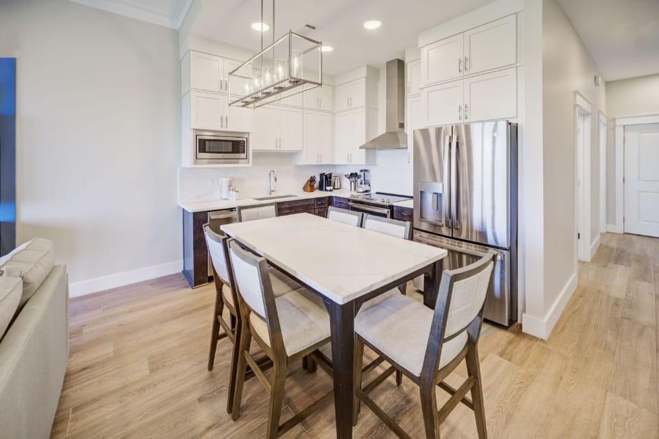 A cozy nook in the kitchen, ideal for quick meals or evening conversations.