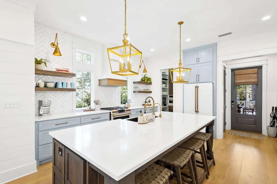 Large kitchen island includes additional seating for 4.