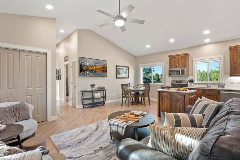The open layout connects the kitchen, dining, and living areas. It's easy to prepare and share meals, then relax together without feeling crowded.