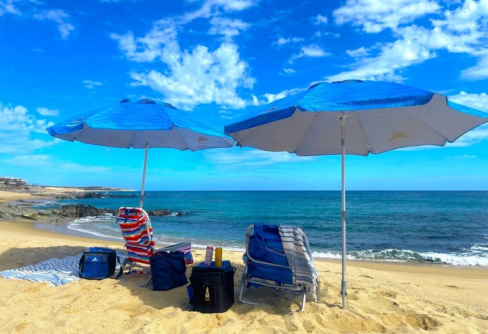Beach chairs, umbrellas, towels and coolers are provided for our guests