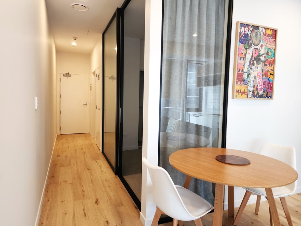 City Apartment | Living area | 50-inch LED TV with satellite channels
