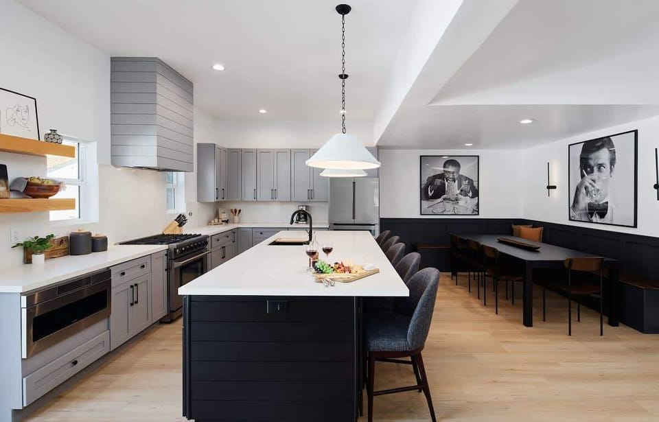 Fully Equipped Kitchen boasting brand-new stainless-steel appliances, ample cabinet / pantry storage and an oversized island offering ample counter space and bar seating.