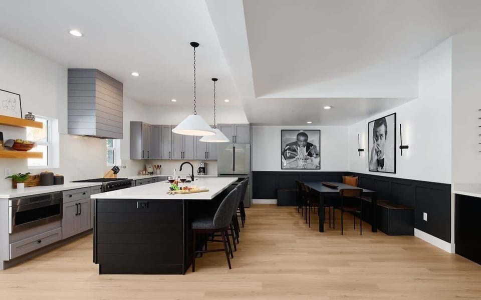 Fully Equipped Kitchen boasting brand-new stainless-steel appliances, ample cabinet / pantry storage and an oversized island offering ample counter space and bar seating.