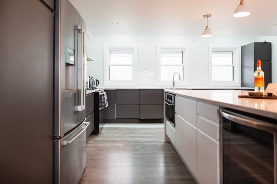 Large fridge, wine fridge, microwave, double oven + stove