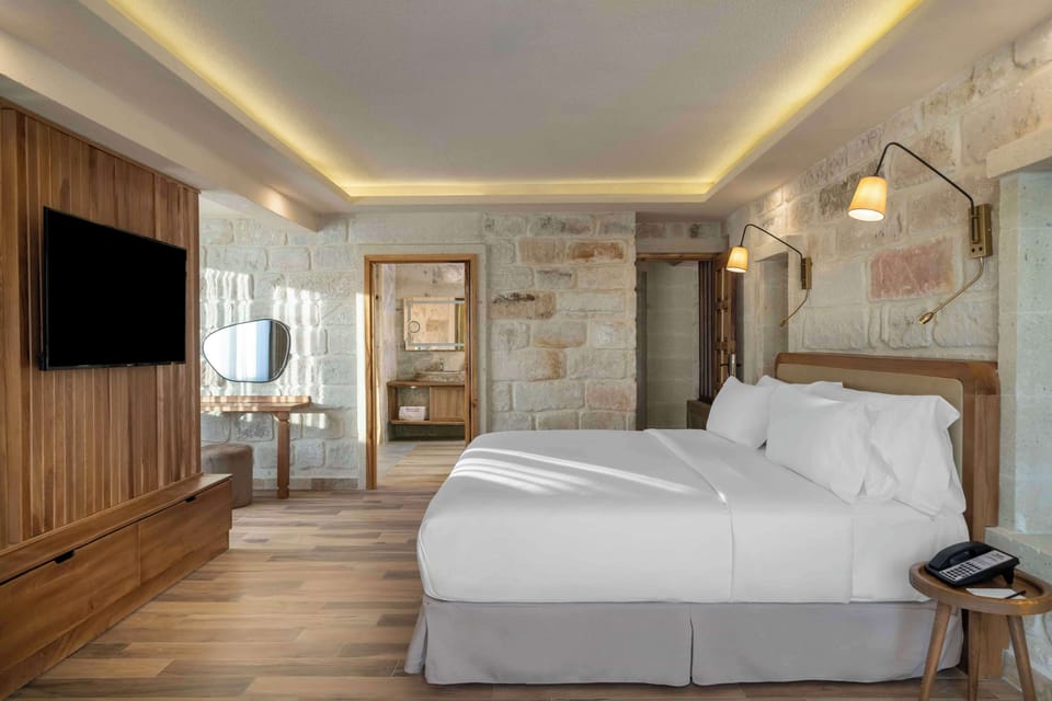 Premium bedding, memory foam beds, minibar, in-room safe