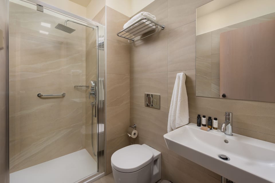 Deep soaking tub, free toiletries, hair dryer, bathrobes