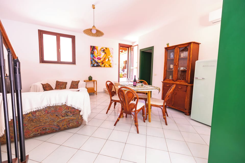 Family Duplex, Kitchen, Ground Floor | Living area | 40-inch flat-screen TV with cable channels