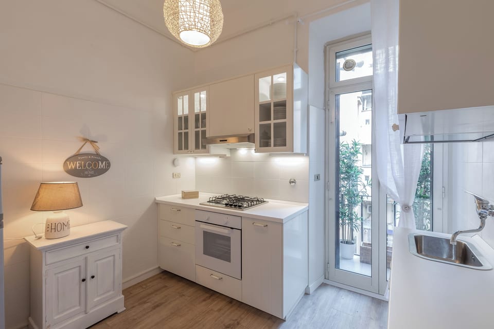 Luxury Apartment | Private kitchen | Espresso maker, coffee/tea maker, electric kettle, dining tables