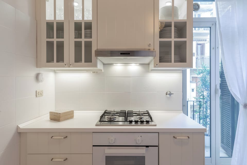 Luxury Apartment | Private kitchen | Espresso maker, coffee/tea maker, electric kettle, dining tables