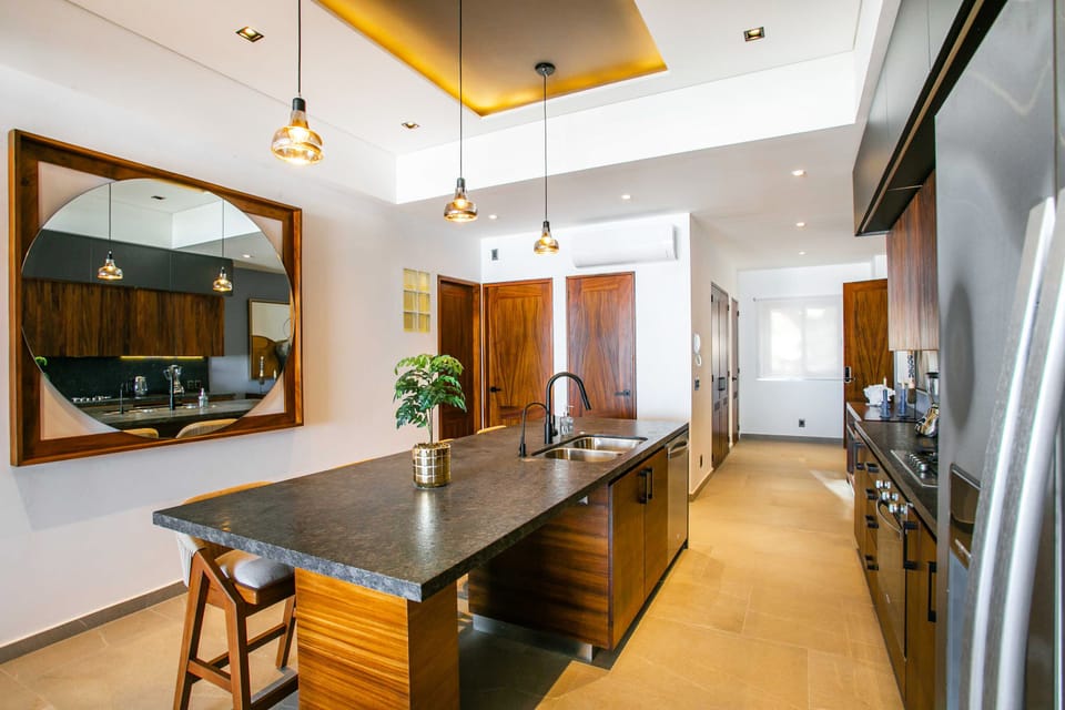 Sophisticated kitchen adorned with exquisite parota wood cabinetry