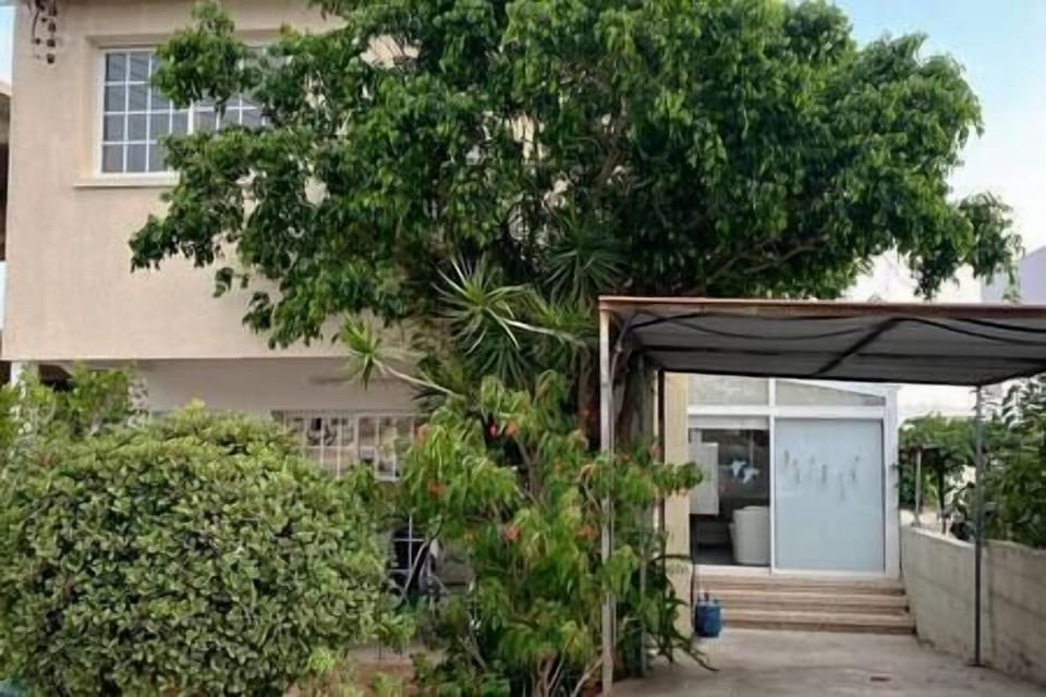This is a property photo with a free covered Parking