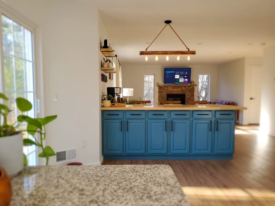 On the main floor kitchen is completely open to the living room and dining room