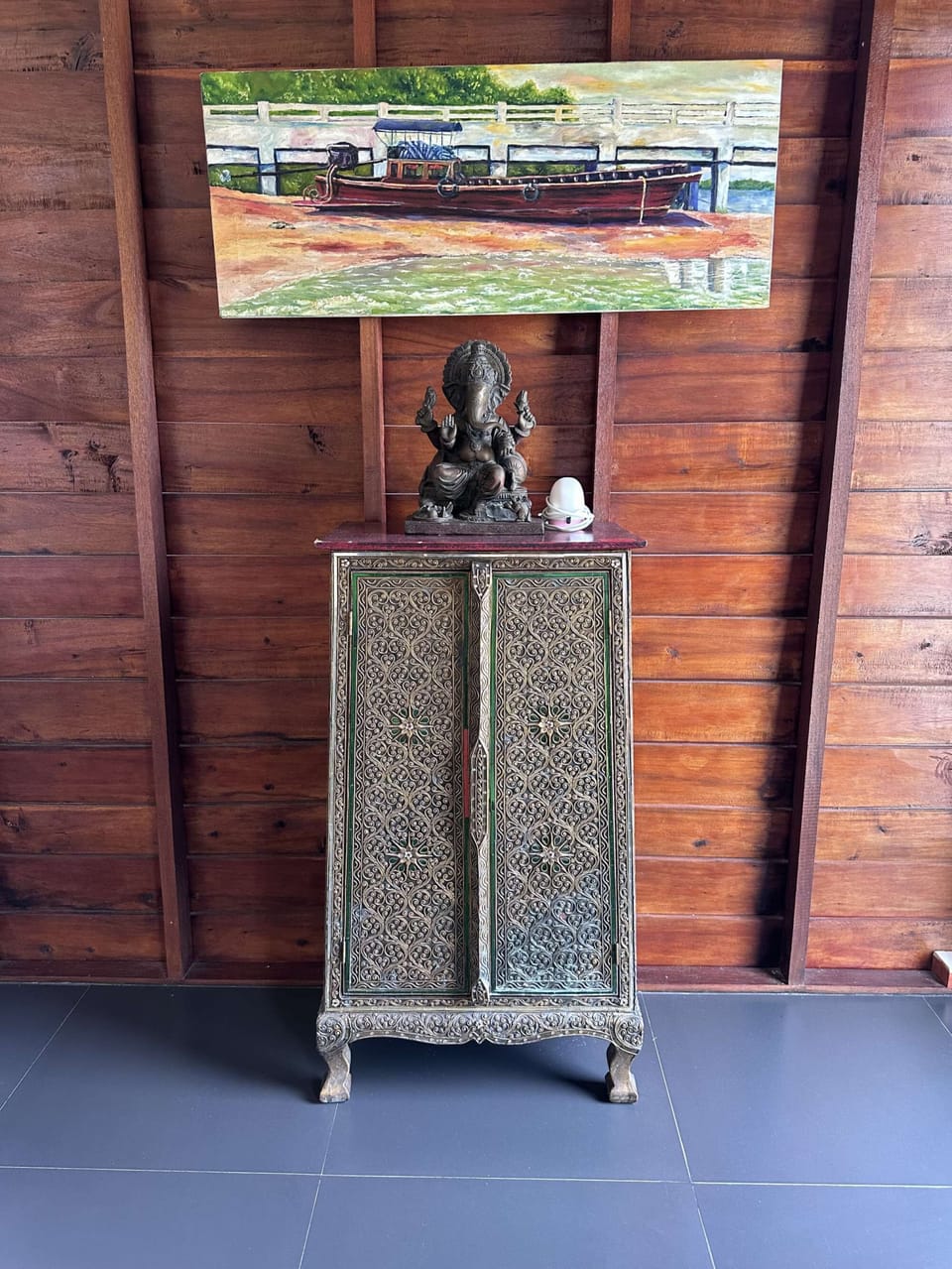 Ornate Thai cupboard and painting