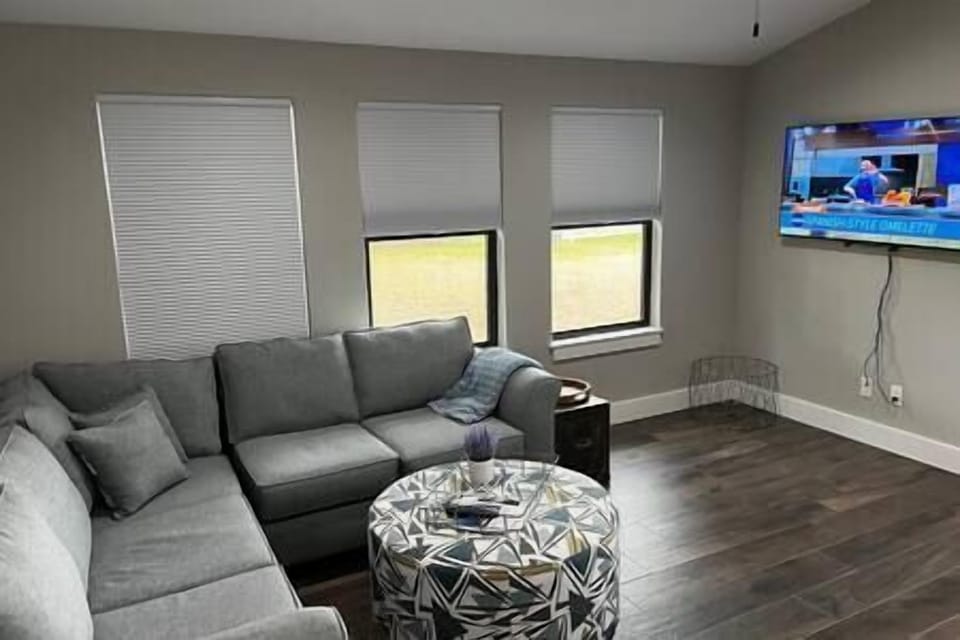 Comfortable living area with OLED smart TV