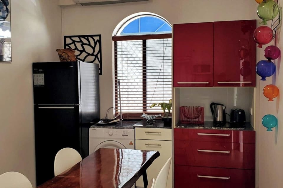 Beautifully appointments. You can open this secured window for fresh air. Apartment has 2 yes TWO aircons for comfort and the two front doors are out fitted with security screen doors for even more  fresh air options