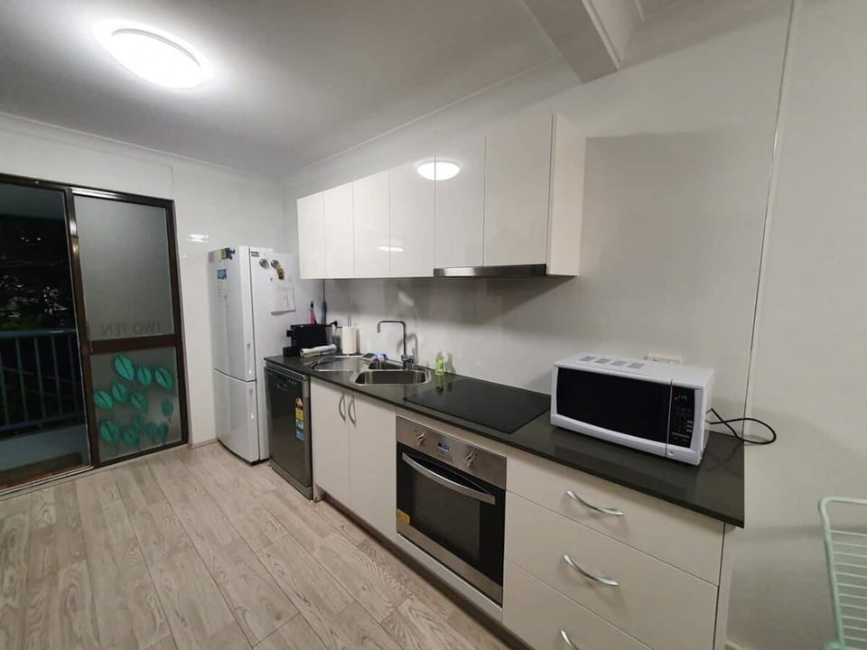 Fully equipped kitchen. Full sized fridge, dishwasher, all the essentials needed to cook and feed the family with, microwave, oven and induction cooktop with security child lock to prevent burn risk.(Be sure to engage for safety & unlock to use)