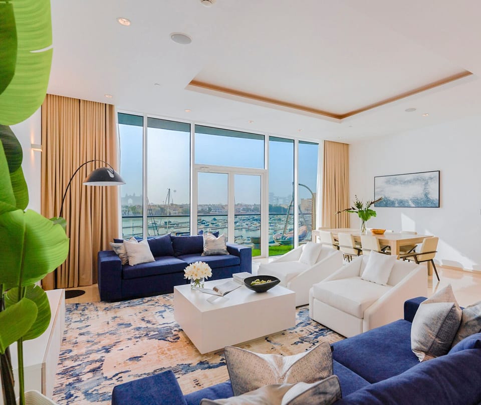 Luxury Apartment, Oceanfront | Living area | Flat-screen TV