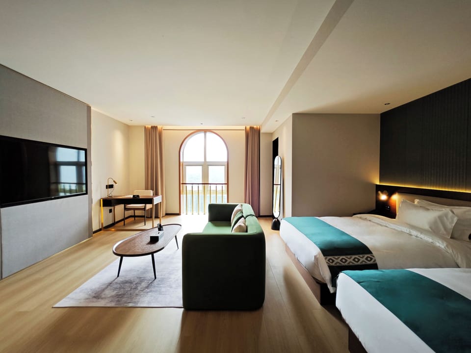 Signature Quadruple Room, Courtyard View | Premium bedding, in-room safe, desk, laptop workspace