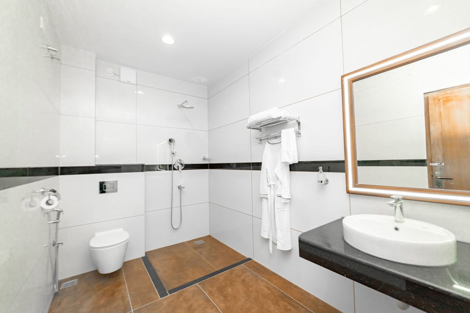 Honeymoon Double Room, Sea View | Bathroom | Shower, free toiletries, hair dryer, towels