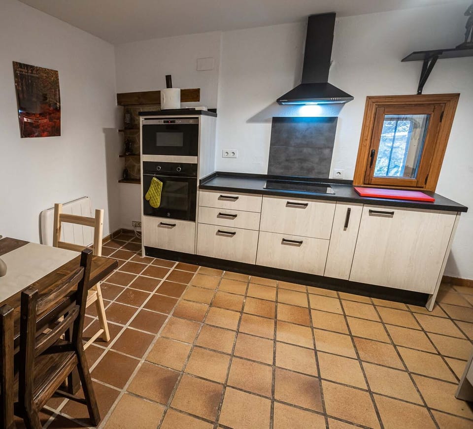 Family House, 4 Bedrooms, Garden View | Private kitchen | Electric kettle, dining tables