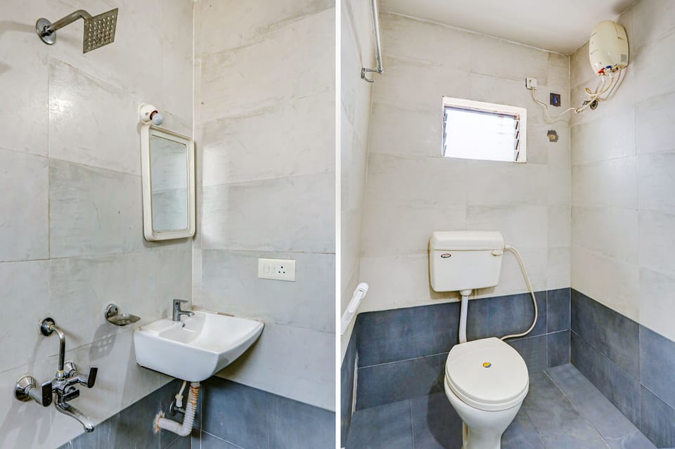 Deluxe Room | Bathroom | Shower, rainfall showerhead, free toiletries, towels