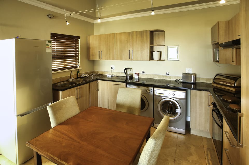 Comfort Apartment | Private kitchen | Full-size fridge, microwave, oven, stovetop