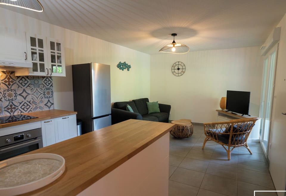 Large air-conditioned living room with open kitchen and Wi-Fi