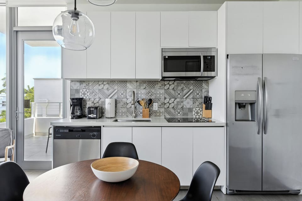 Design Apartment | Private kitchen | Full-size fridge, microwave, stovetop, dishwasher