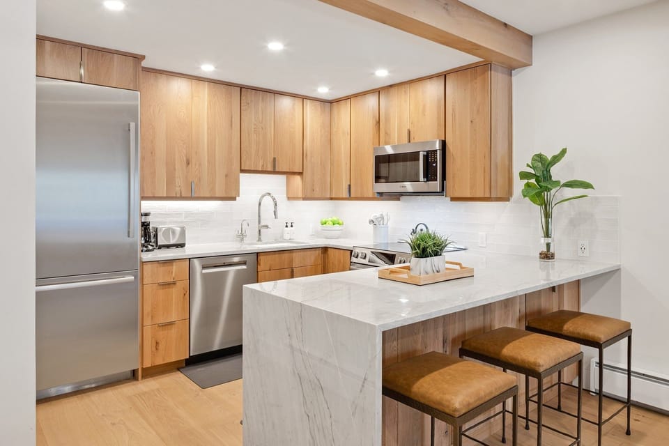 Condo, 2 Bedrooms | Private kitchen | Fridge, oven, coffee/tea maker