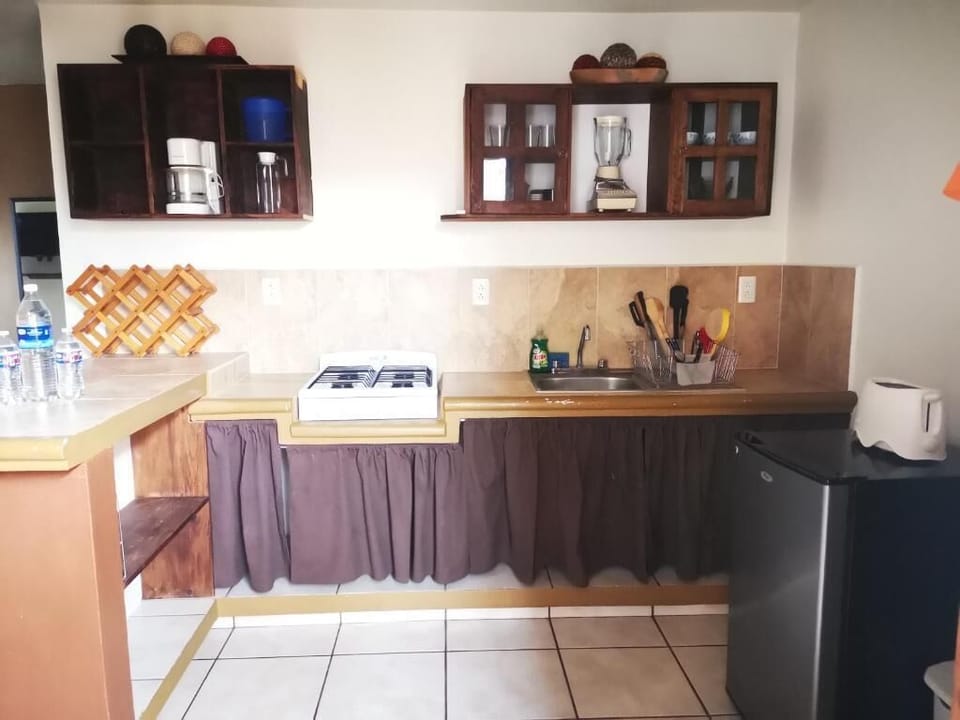 Mini-fridge, microwave (on request), toaster, blender