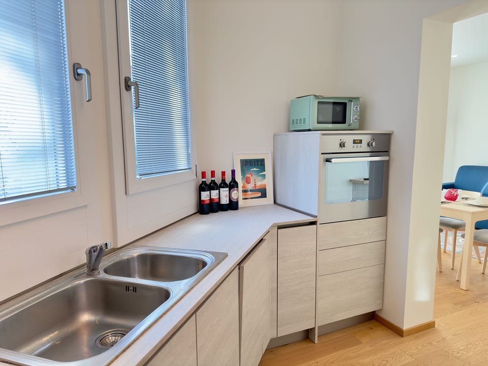 Luxury Apartment | Private kitchen | Full-size fridge, microwave, oven, stovetop