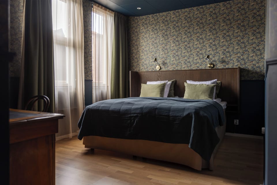 Double or Twin Room, Courtyard View | Desk, laptop workspace, free WiFi, bed sheets