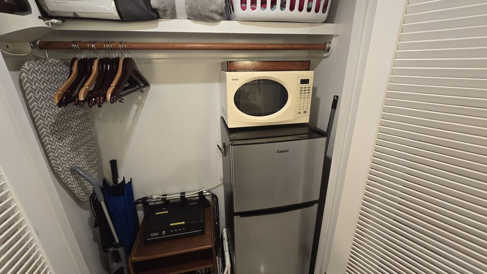 Security safe, refrigerator and microwave oven.