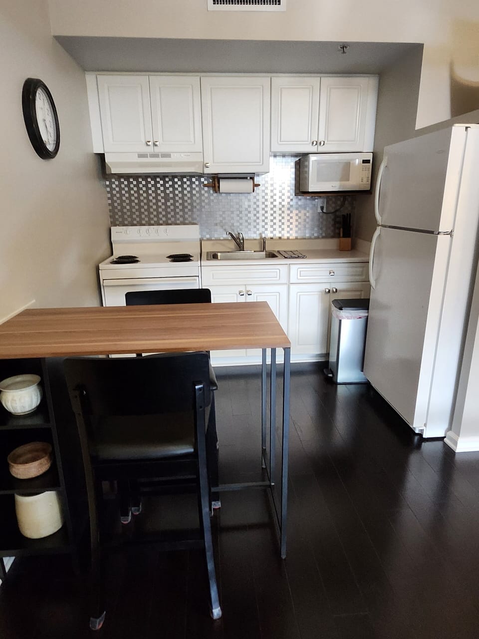 Full sized fridge and microwave.