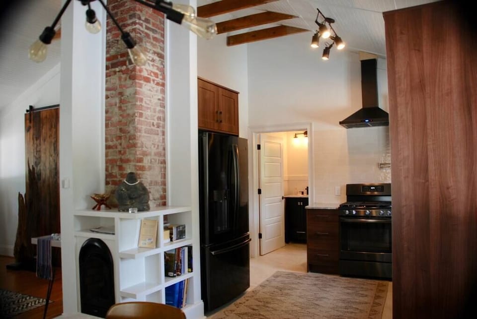 Gas fireplace in open concept living area.