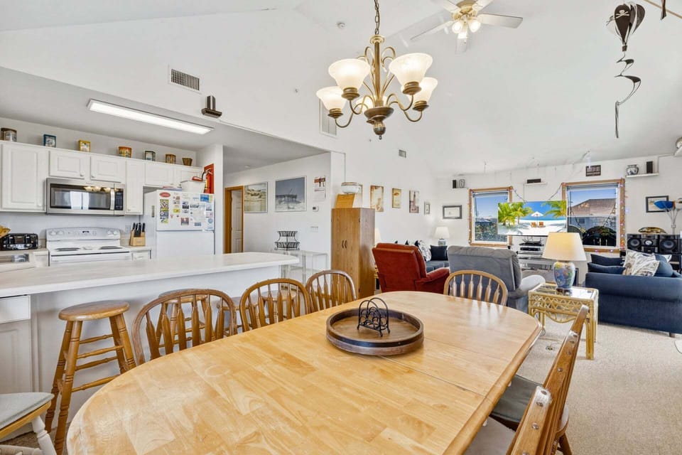 Enjoy meals together in the dining area, conveniently located next to the kitchen.