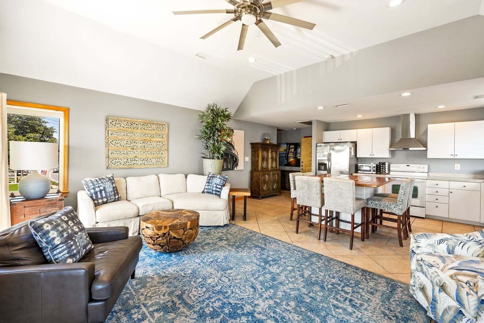 The open-concept Dining Area and Kitchen create a space where every meal becomes a cherished memory.