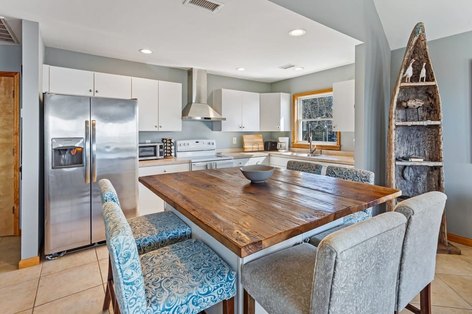 Whip up something delicious in the open-concept Kitchen and Dining Area.