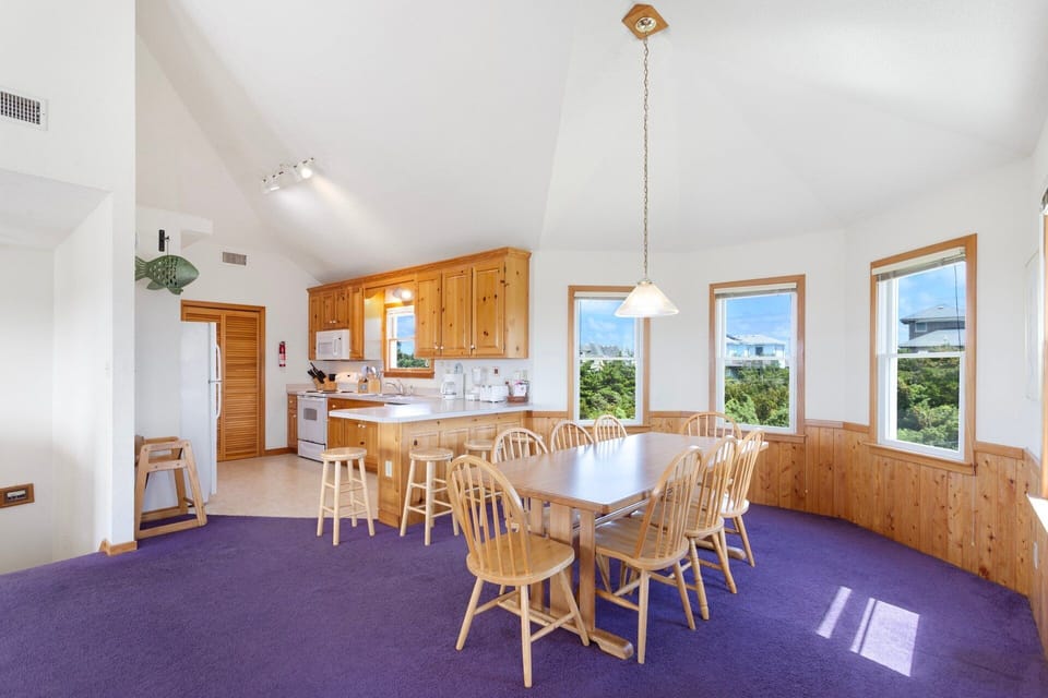 Dining Area: Coastal-inspired Dining Area where the whole family can enjoy meals together.
