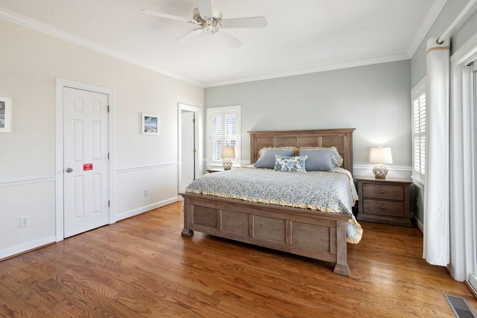 The mid-level King Master Bedroom with Deck Access is the perfect, spacious evening retreat.
